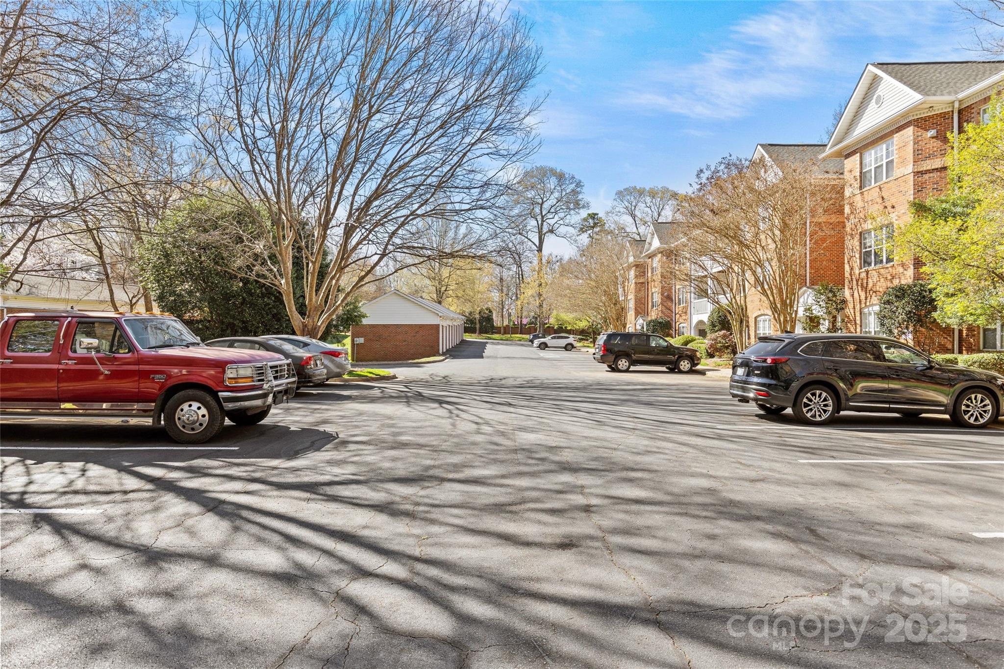 5601 Fairview Road, Unit 24 Charlotte, NC 28209 - Photo 36 of 38 a view of a cars parked on the side of a street
