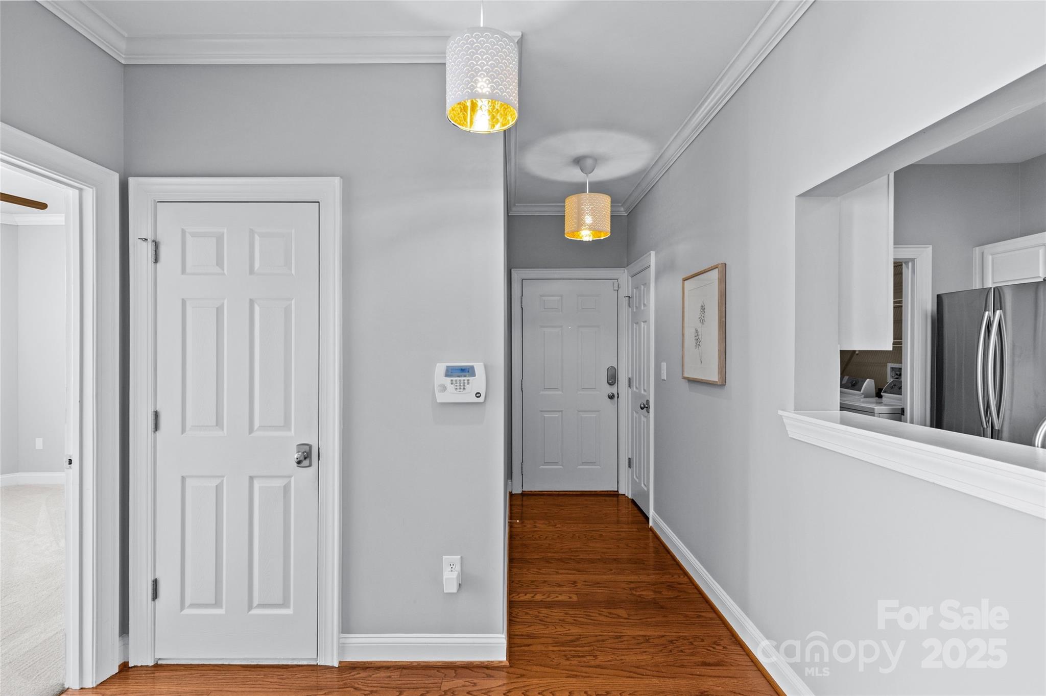 5601 Fairview Road, Unit 24 Charlotte, NC 28209 - Photo 6 of 38 a view of a hallway with wooden floor