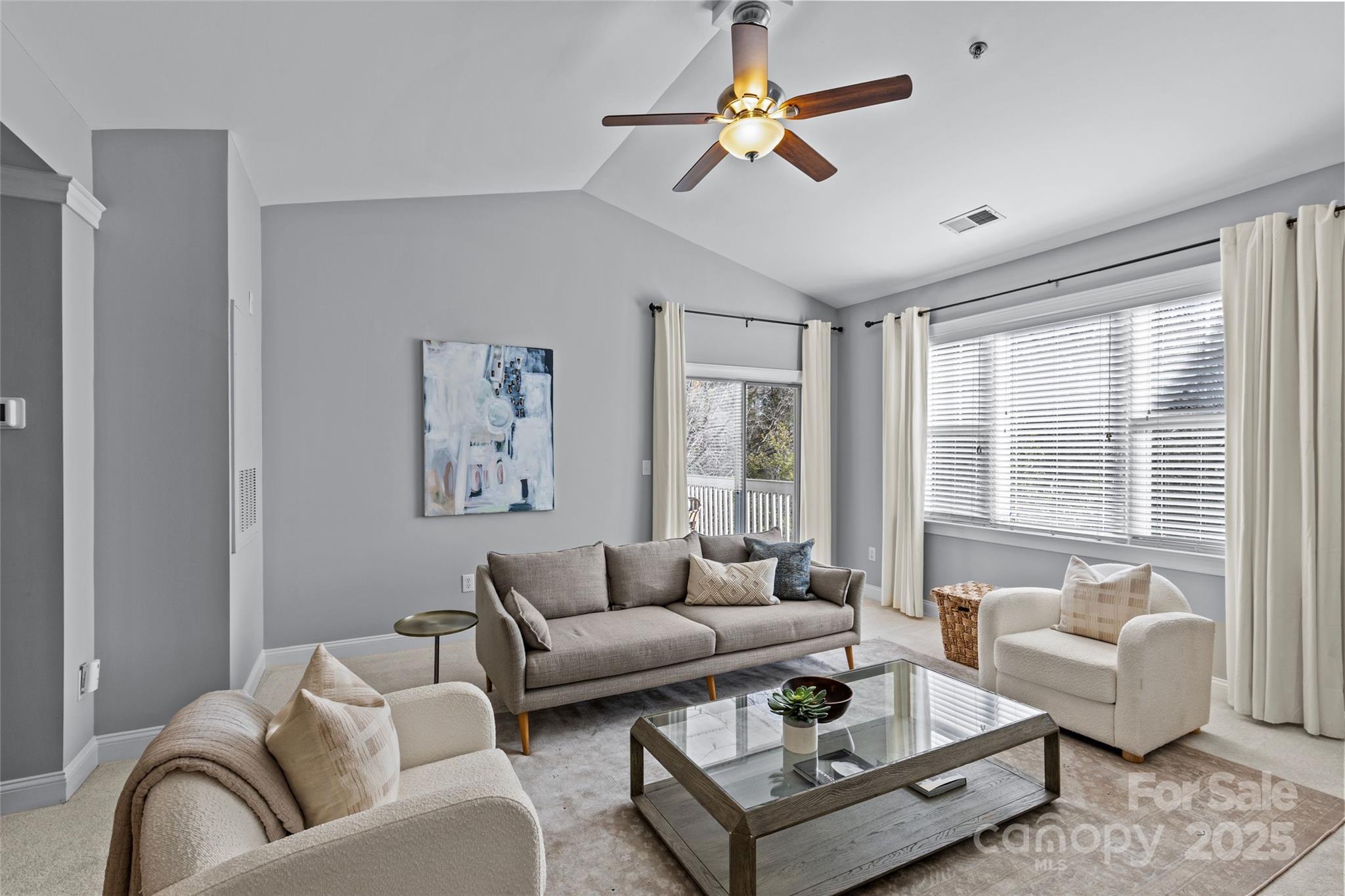 5601 Fairview Road, Unit 24 Charlotte, NC 28209 - Photo 8 of 38 a living room with furniture and a large window