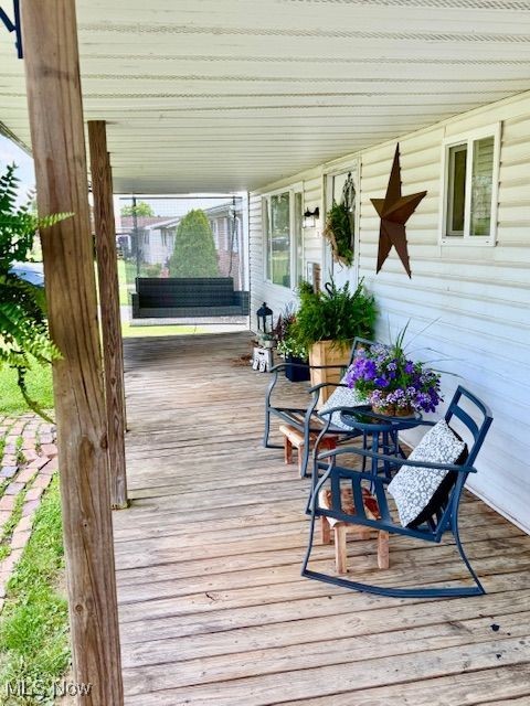 75 Ridgeland Drive Toronto, OH 43964 - Photo 3 of 18 View of wooden deck