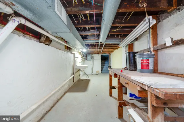 a utility room with cabinets