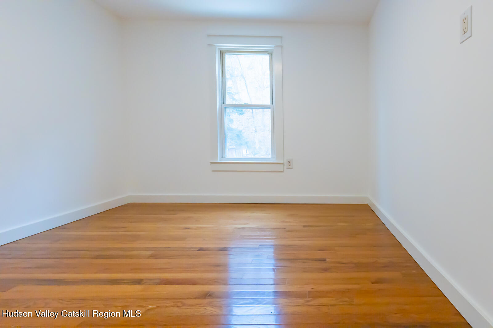 148 Esopus Creek Road Saugerties, NY 12477 - Photo 12 of 19 a view of a room with wooden floor and window