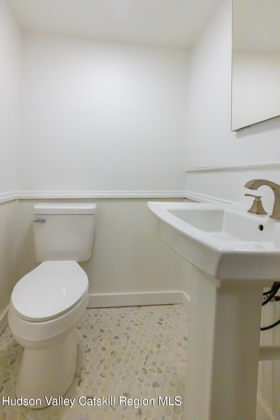 148 Esopus Creek Road Saugerties, NY 12477 - Photo 16 of 19 a bathroom with a toilet and a sink