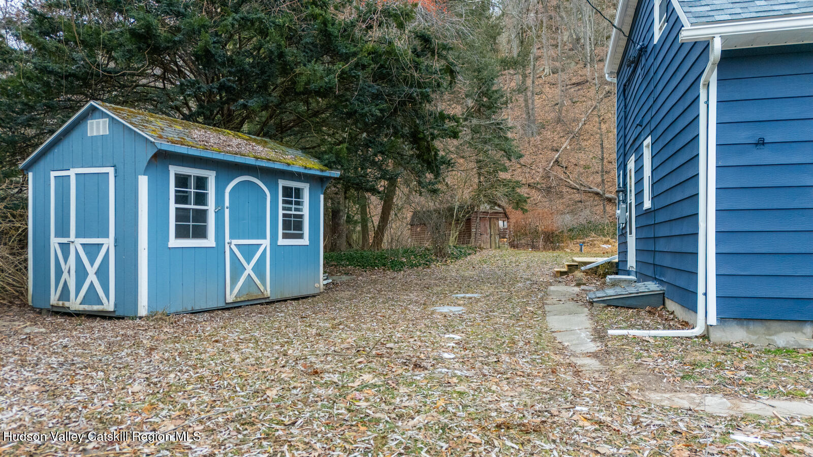 148 Esopus Creek Road Saugerties, NY 12477 - Photo 18 of 19 a view of a house with a yard