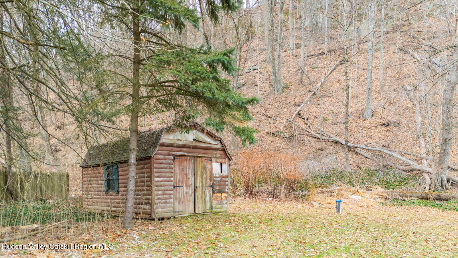 148 Esopus Creek Road Saugerties, NY 12477 - Photo 19 of 19 a view of a wooden house with a yard