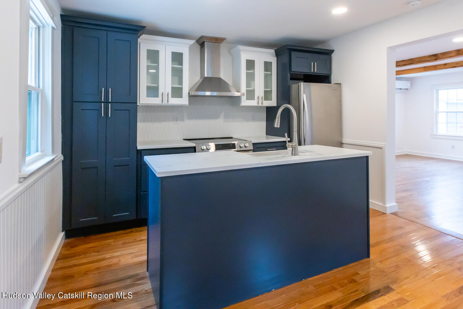 148 Esopus Creek Road Saugerties, NY 12477 - Photo 5 of 19 a kitchen with stainless steel appliances granite countertop a stove a sink and a refrigerator