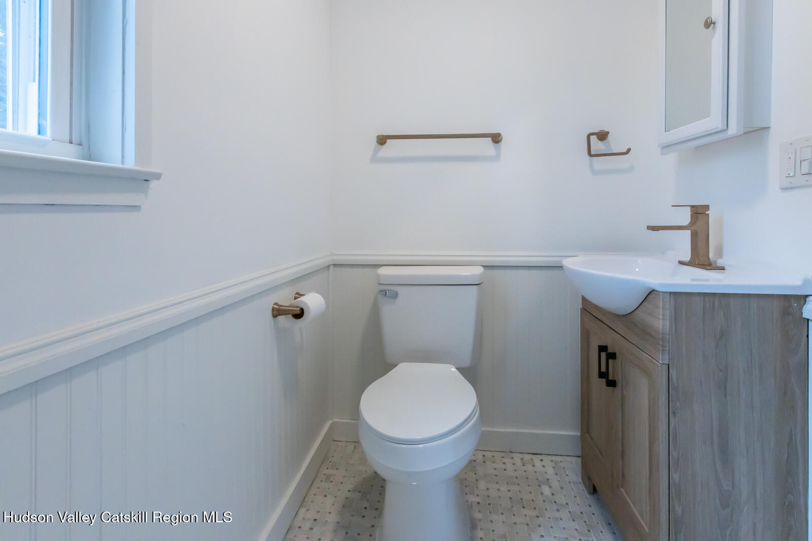 148 Esopus Creek Road Saugerties, NY 12477 - Photo 8 of 19 a bathroom with a toilet and a sink