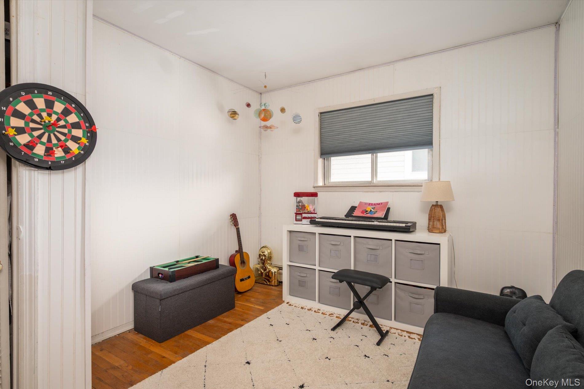 7 Stein Street Valley Stream, NY 11580 - Photo 11 of 27 Living area featuring wood finished floors