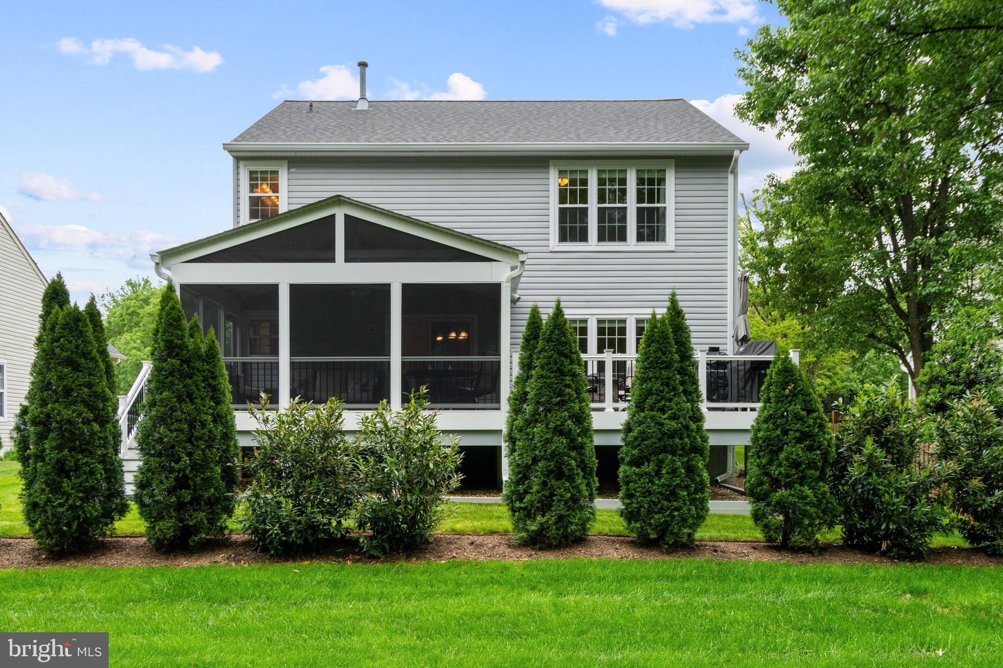 21397 Springwell Drive Broadlands, VA 20148 - Photo 2 of 43 Private Yard with Screened Porch and Deck