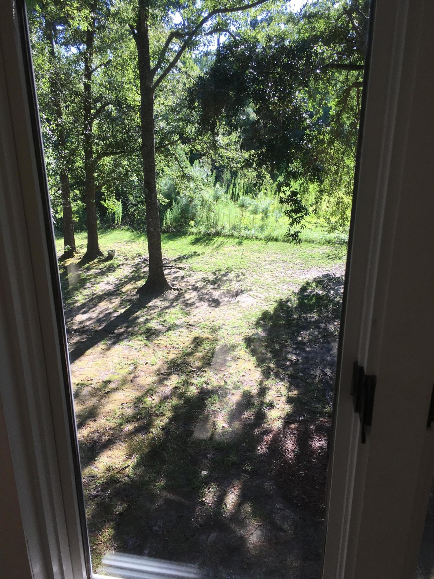 159 Brickyard Point Road South, Unit C Beaufort, SC 29907 - Photo 7 of 14 view from sunroom