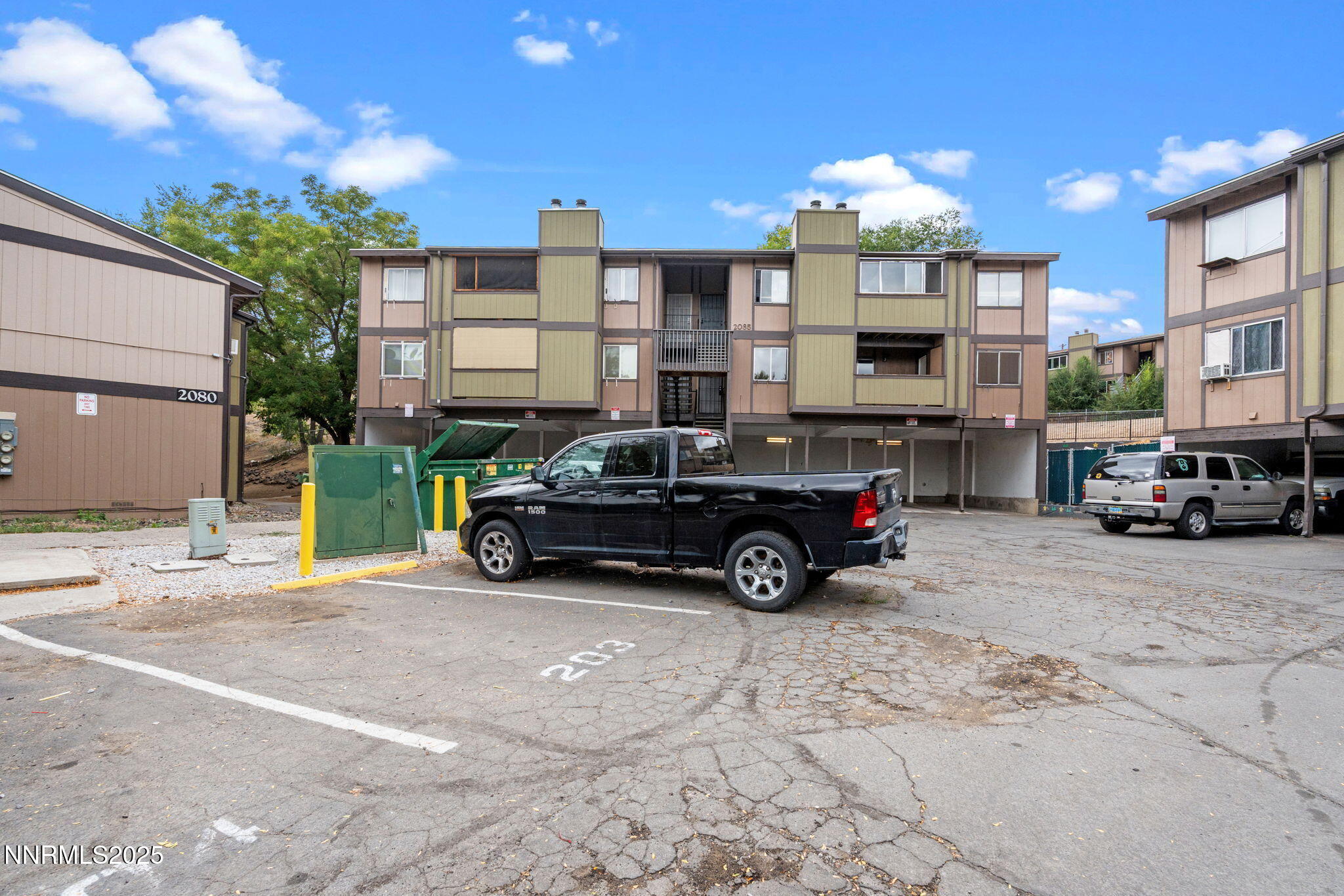 2085 Highview Court, Unit 2 Reno, NV 89512 - Photo 4 of 26 a car parked in front of a building