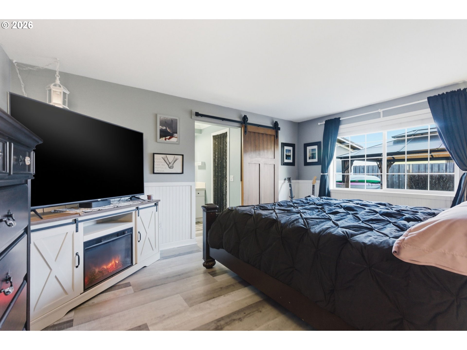 1801 North Cedar Street Newberg, OR 97132 - Photo 13 of 30 a living room with a flat screen tv and a fireplace