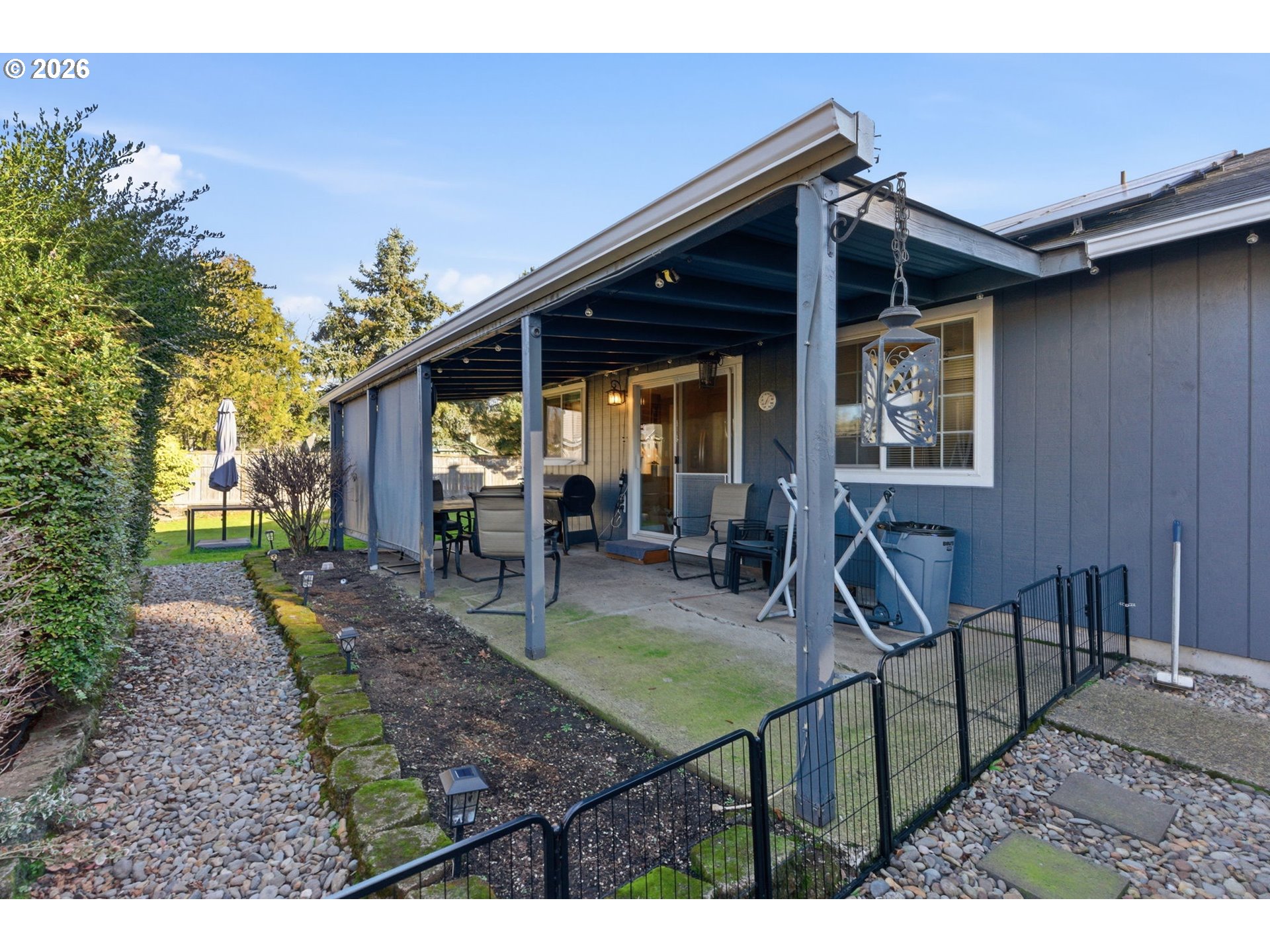 1801 North Cedar Street Newberg, OR 97132 - Photo 22 of 30 a view of a house with patio