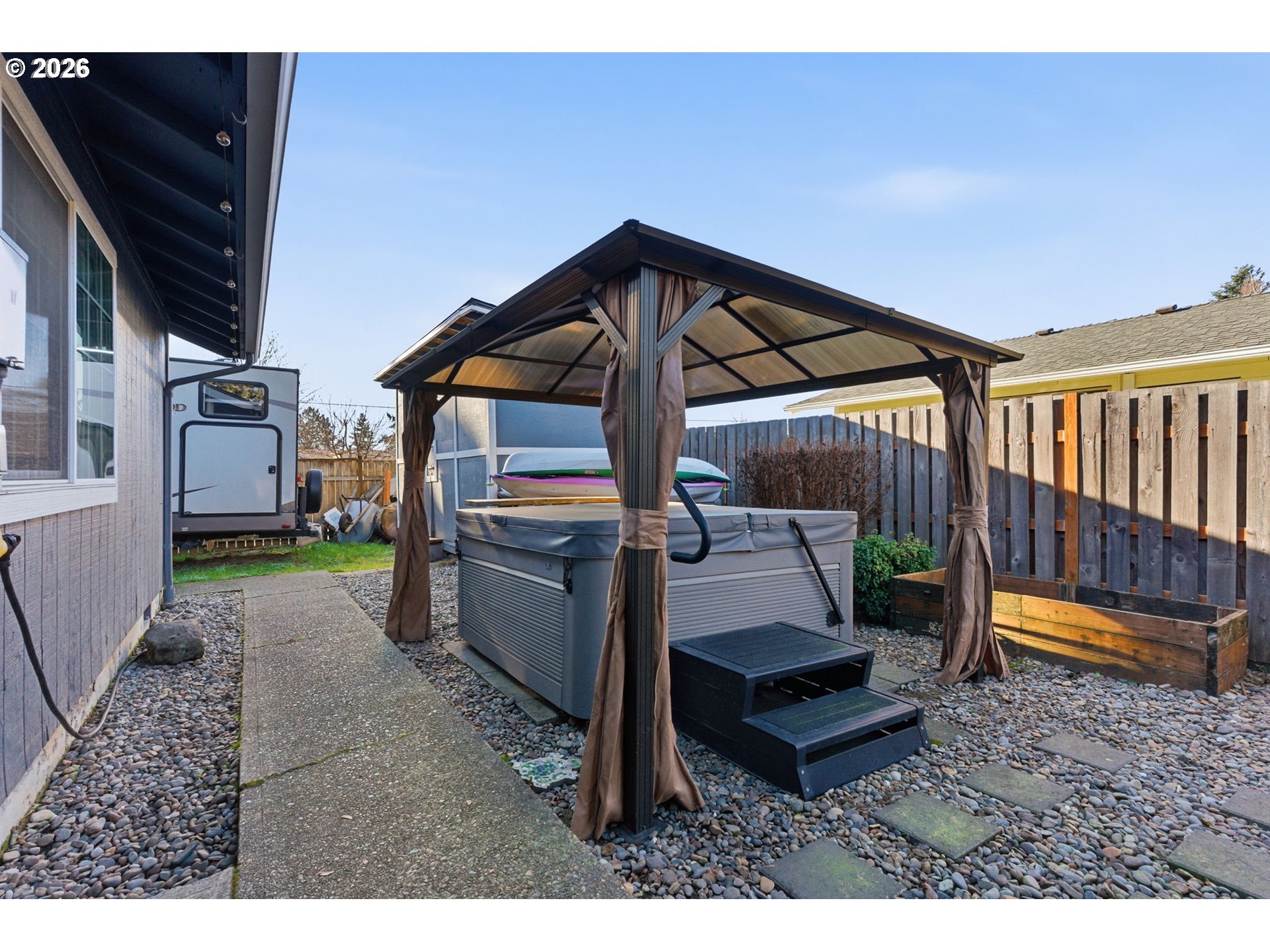 1801 North Cedar Street Newberg, OR 97132 - Photo 23 of 30 a backyard of a house with a fountain