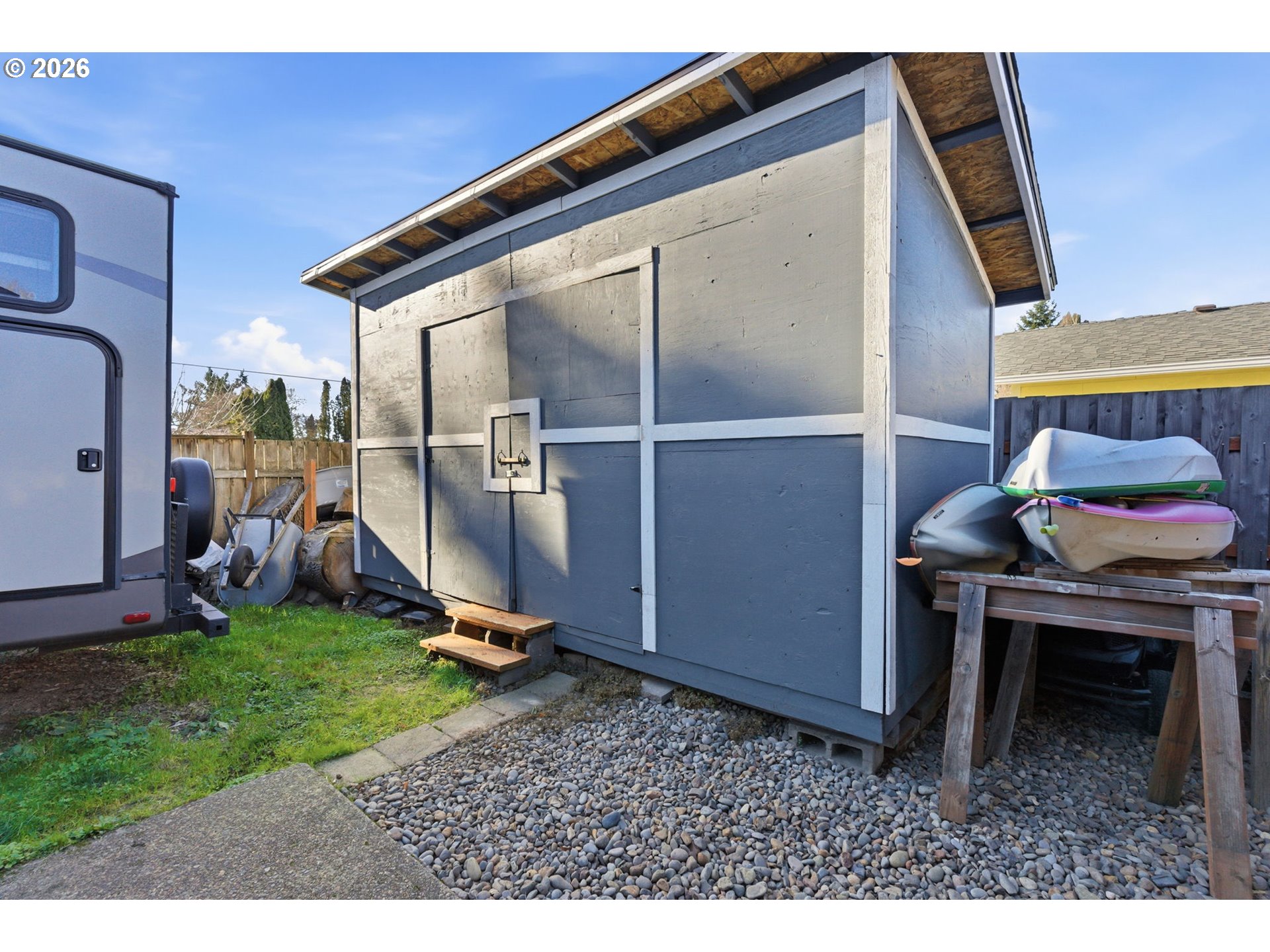 1801 North Cedar Street Newberg, OR 97132 - Photo 24 of 30 a backyard of a house with barbeque oven table and chairs