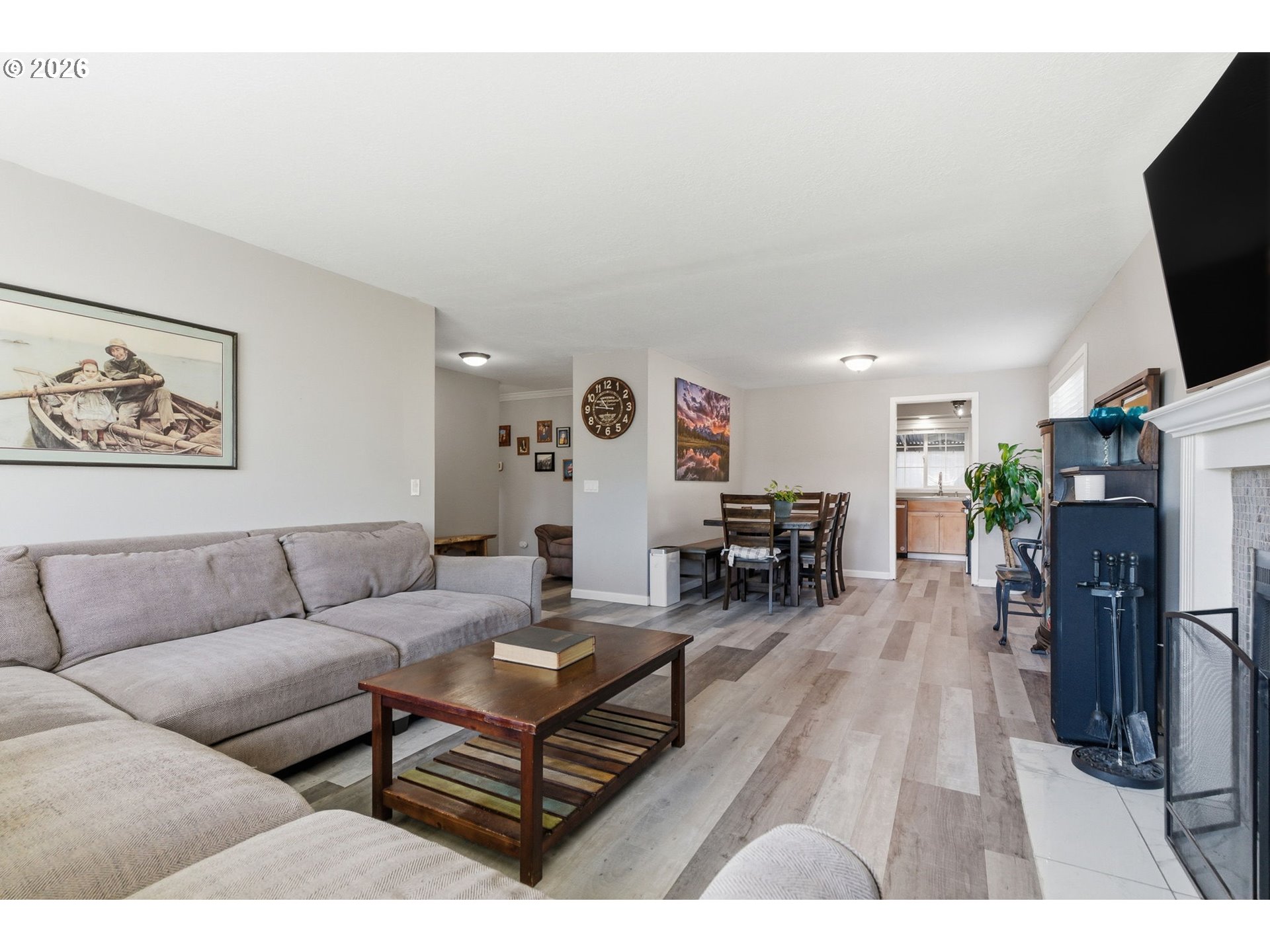 1801 North Cedar Street Newberg, OR 97132 - Photo 4 of 30 a living room with furniture and a flat screen tv