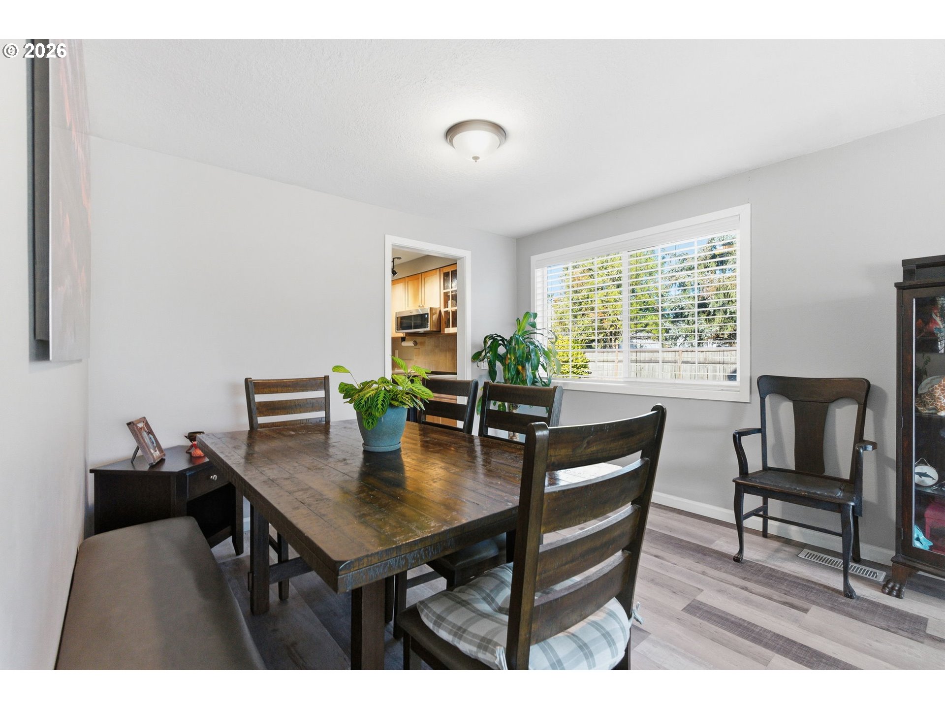 1801 North Cedar Street Newberg, OR 97132 - Photo 6 of 30 a view of a dining room with furniture and a window