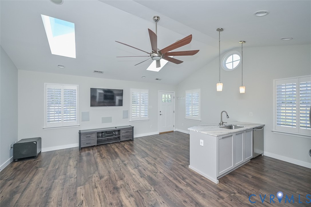 8441 Buffin Road Henrico, VA 23231 - Photo 12 of 50 a living room with stainless steel appliances kitchen island hardwood floor and a window