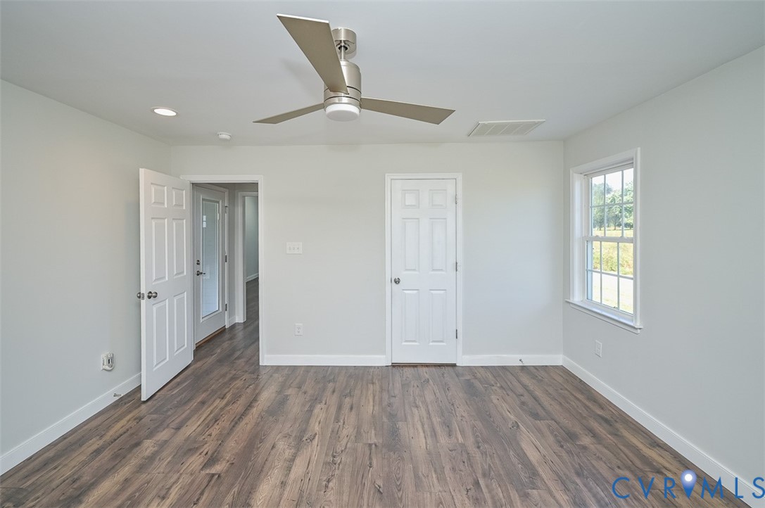 8441 Buffin Road Henrico, VA 23231 - Photo 19 of 50 wooden floor in an empty room with a window