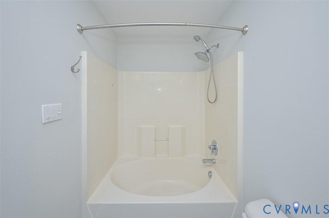 8441 Buffin Road Henrico, VA 23231 - Photo 29 of 50 a close view of a bathtub in a bathroom