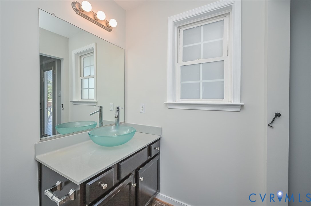 8441 Buffin Road Henrico, VA 23231 - Photo 30 of 50 a room with a table and chairs
