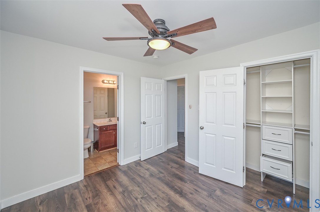 8441 Buffin Road Henrico, VA 23231 - Photo 33 of 50 a view of an empty room with a window and wooden floor