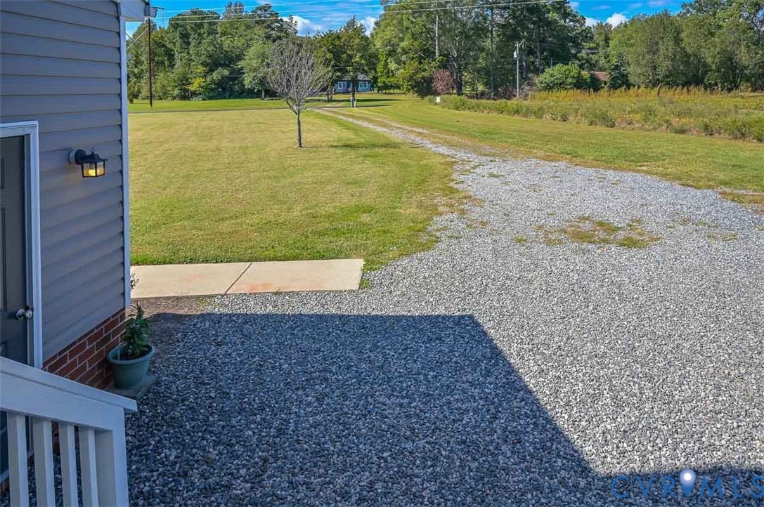 8441 Buffin Road Henrico, VA 23231 - Photo 44 of 50 a view of a yard with a house