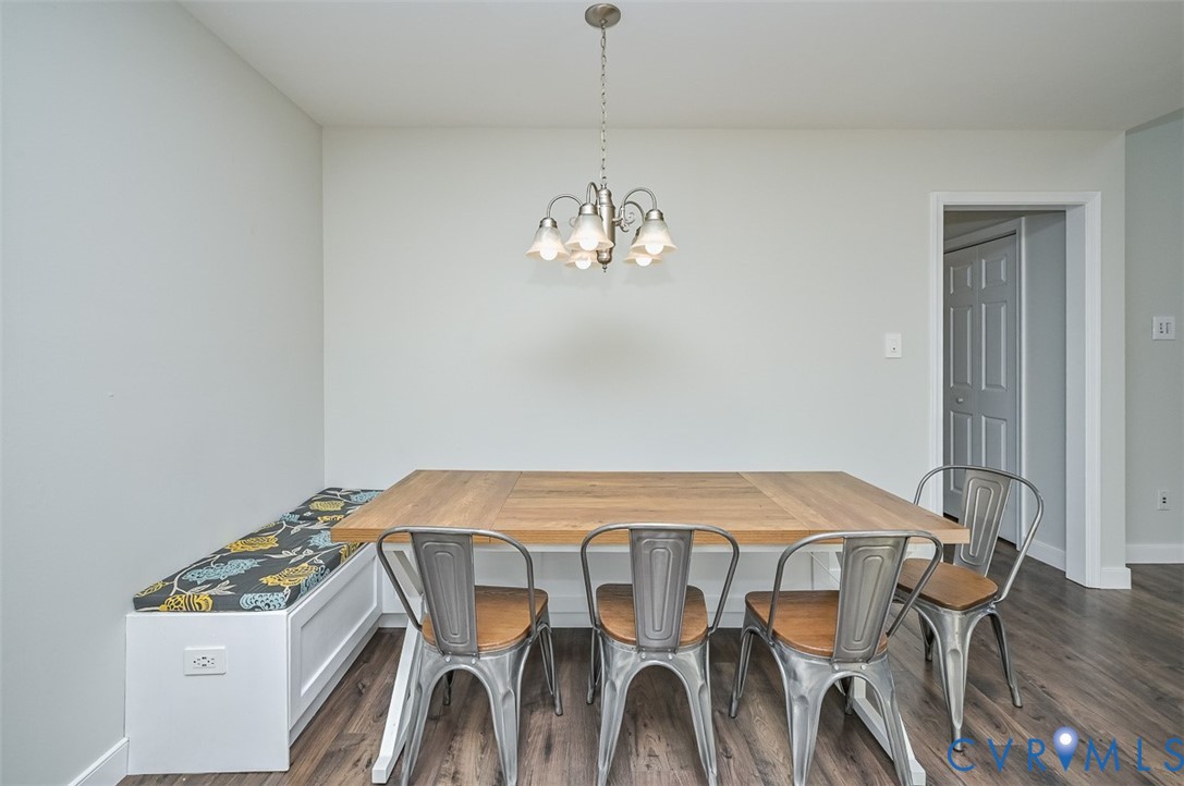 8441 Buffin Road Henrico, VA 23231 - Photo 9 of 50 a view of a dining room with furniture and wooden floor