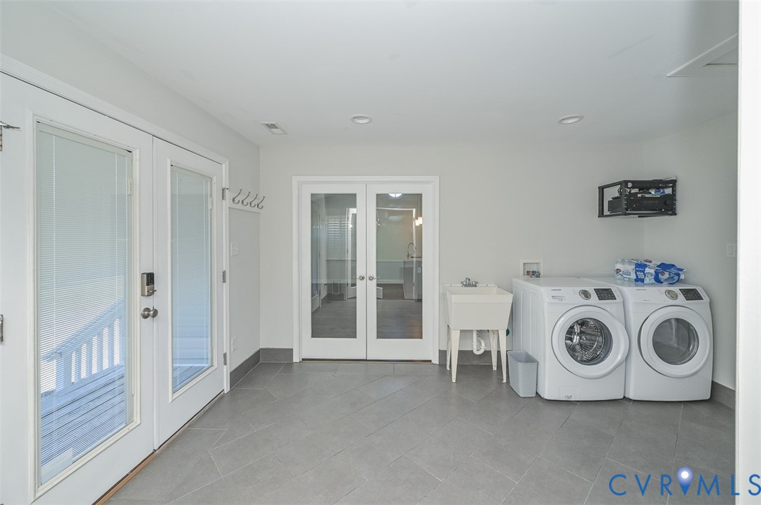 8441 Buffin Road Henrico, VA 23231 - Photo 10 of 50 a view of storage and utility room with washer and dryer