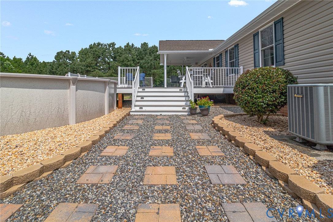 184 Crosshills Road Heathsville, VA 22473 - Photo 7 of 44 Above-ground pool with surrounding gravel landscap