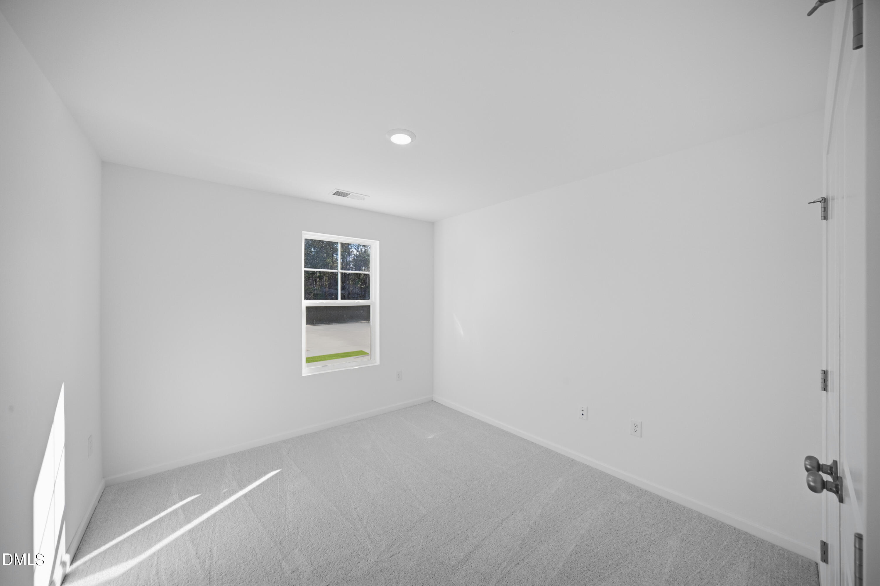 2921 Hickory Fld Drive Raleigh, NC 27616 - Photo 15 of 30 an empty room with windows