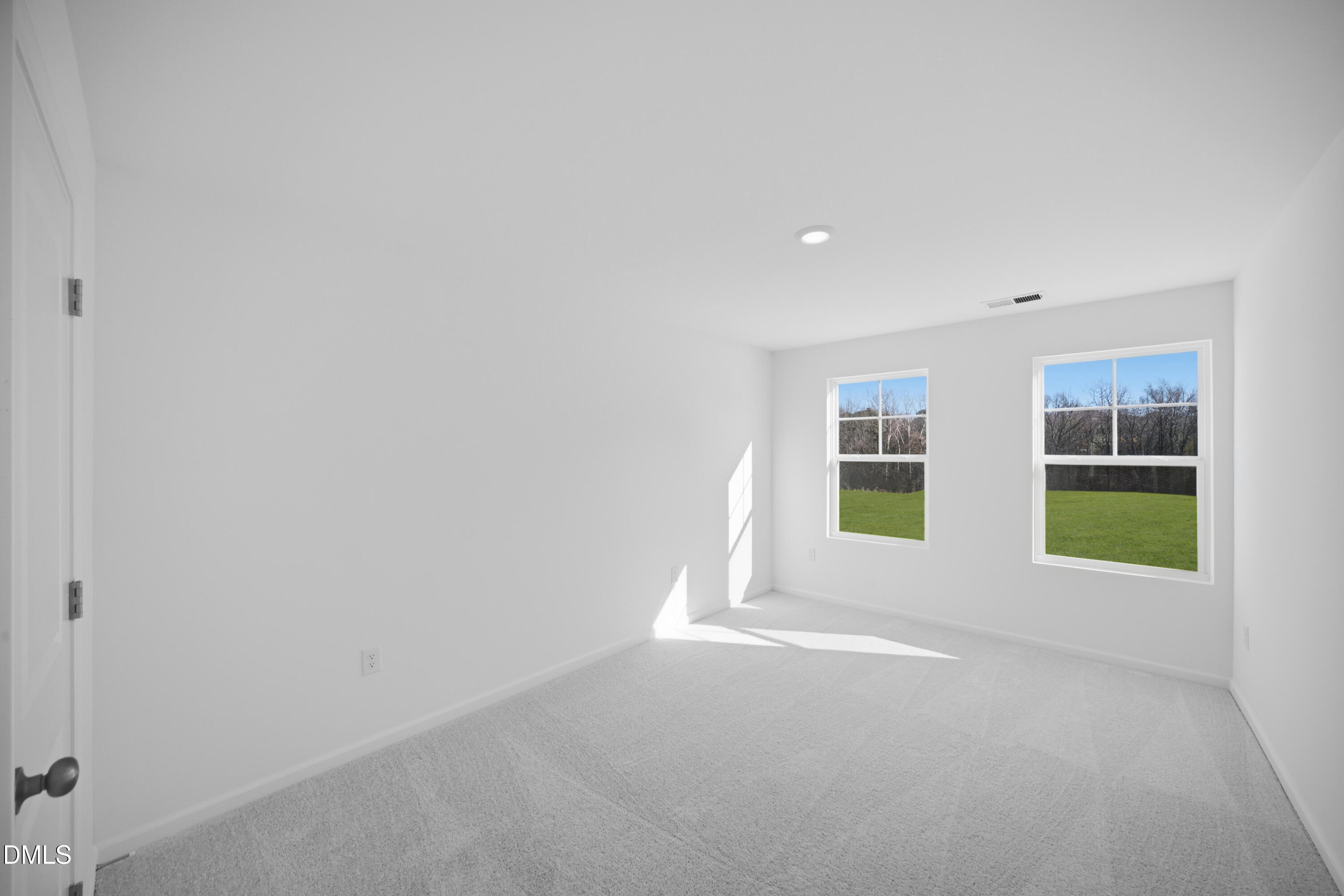 2921 Hickory Fld Drive Raleigh, NC 27616 - Photo 17 of 30 a view of an empty room with a window