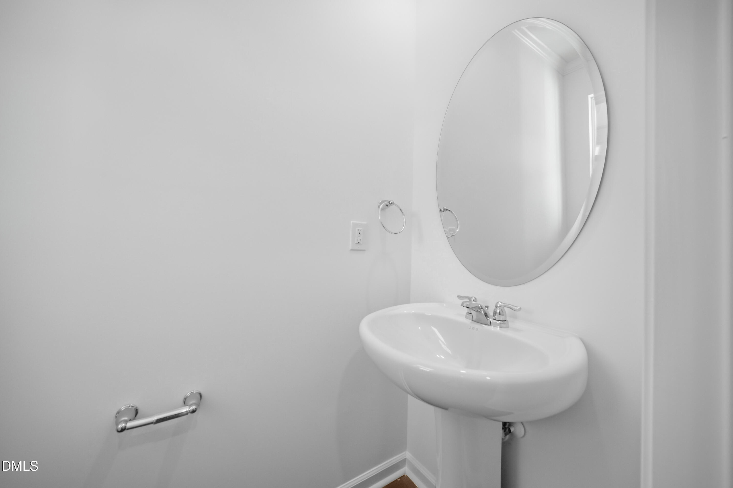 2921 Hickory Fld Drive Raleigh, NC 27616 - Photo 29 of 30 a bathroom with a sink and a mirror