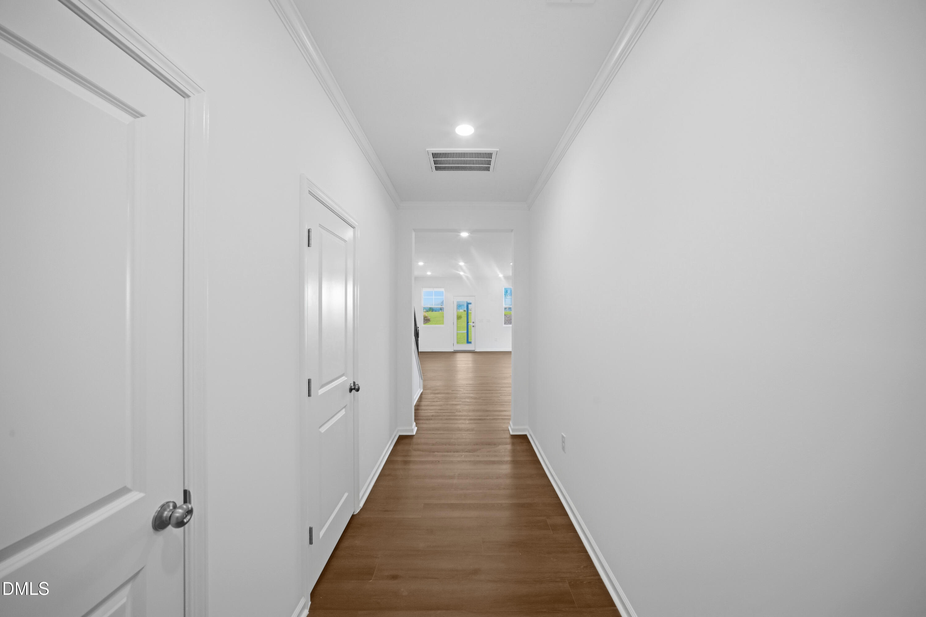2921 Hickory Fld Drive Raleigh, NC 27616 - Photo 3 of 30 a view of a hallway with wooden floor