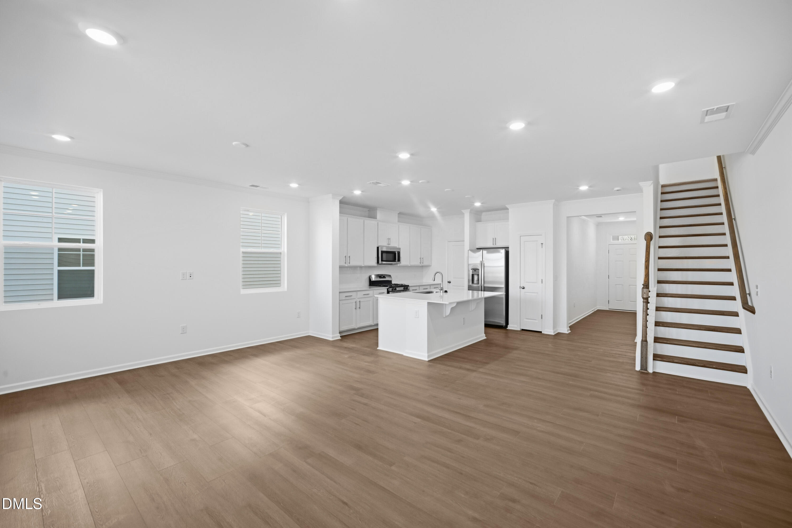 2921 Hickory Fld Drive Raleigh, NC 27616 - Photo 5 of 30 a view of kitchen with wooden floor and window