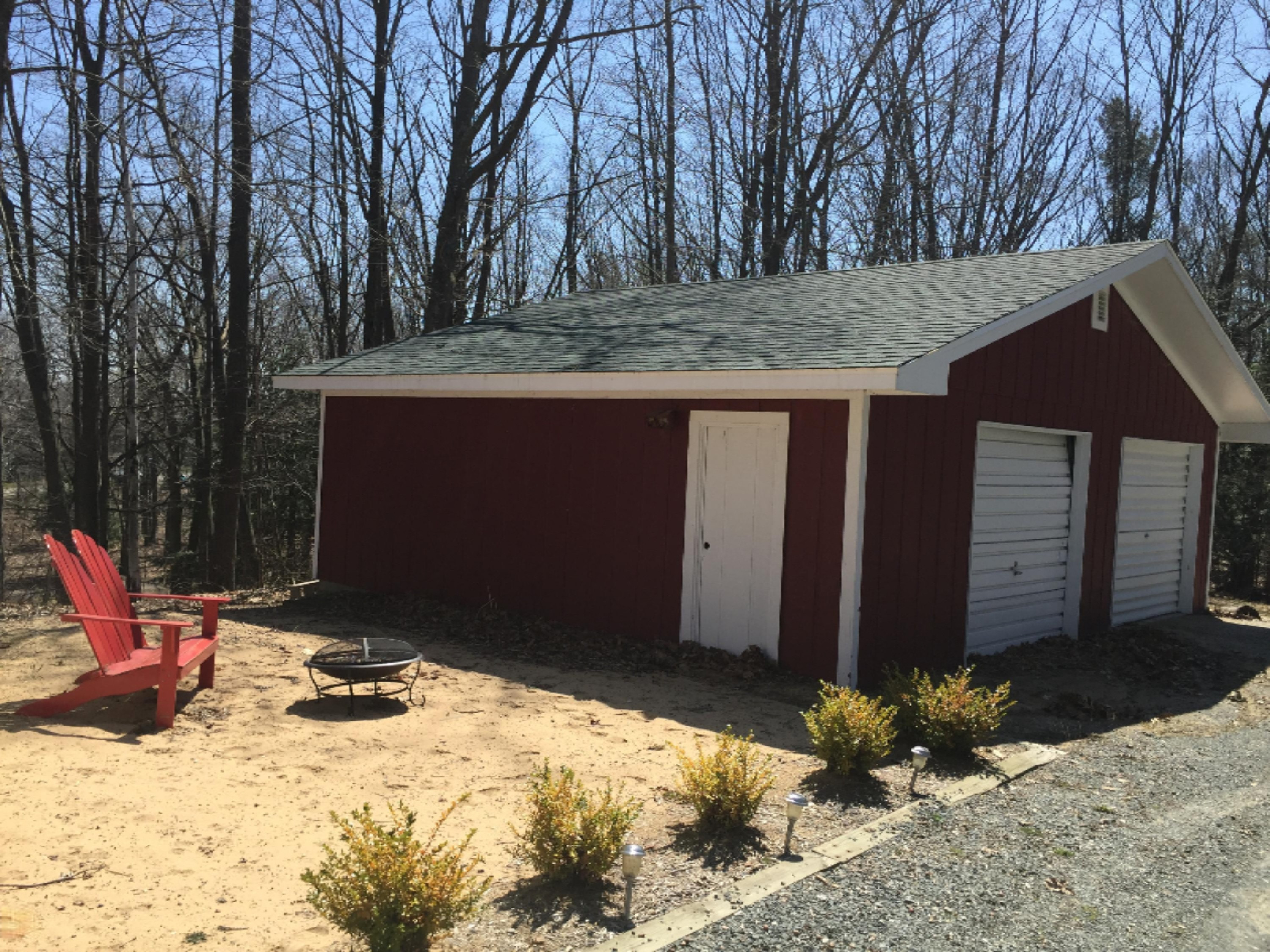 2704 Piney Ridge Road Ludington, MI 49431 - Photo 3 of 13 Barn and Side Yard