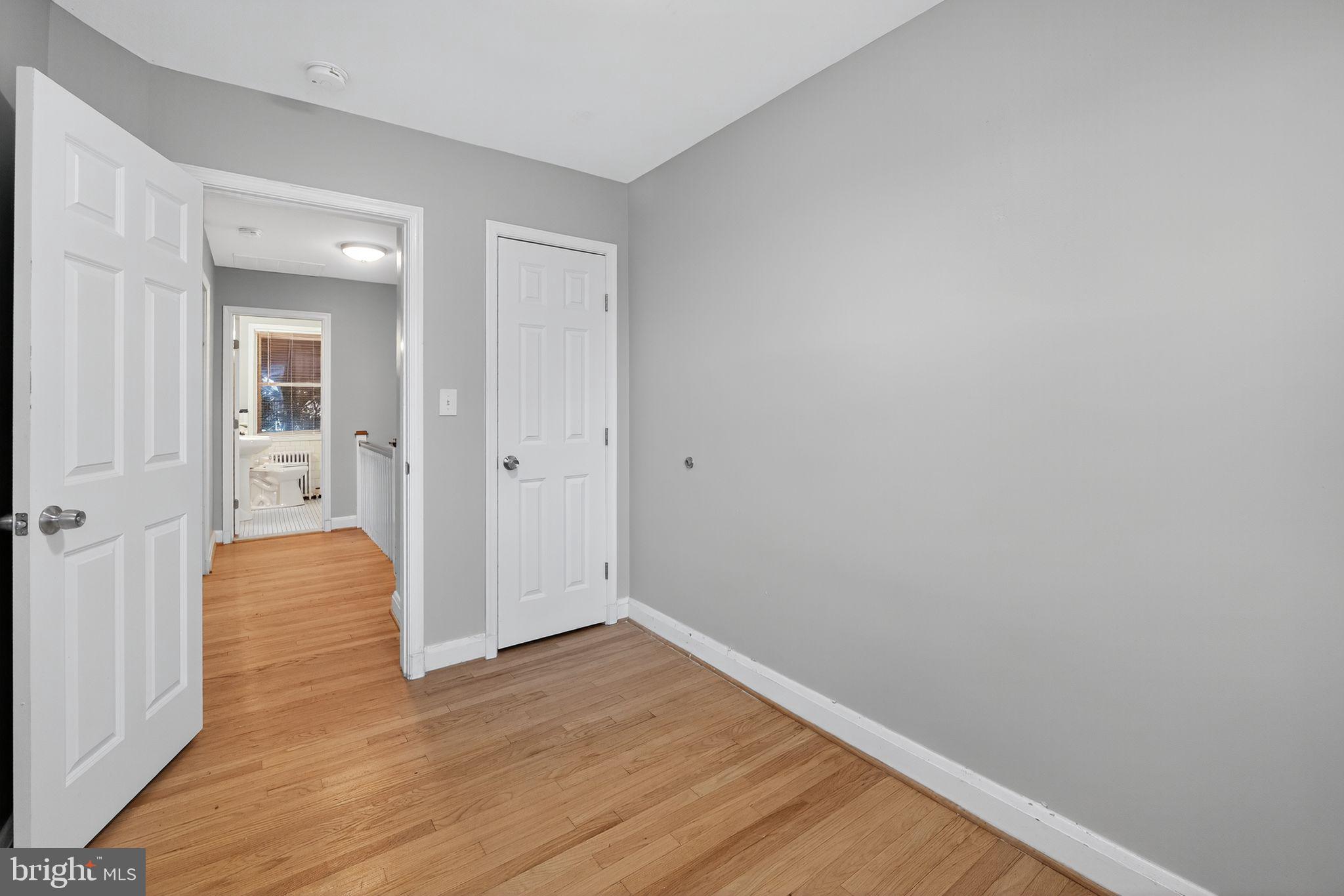 1017 Wicklow Road Baltimore, MD 21229 - Photo 20 of 34 wooden floor in an empty room