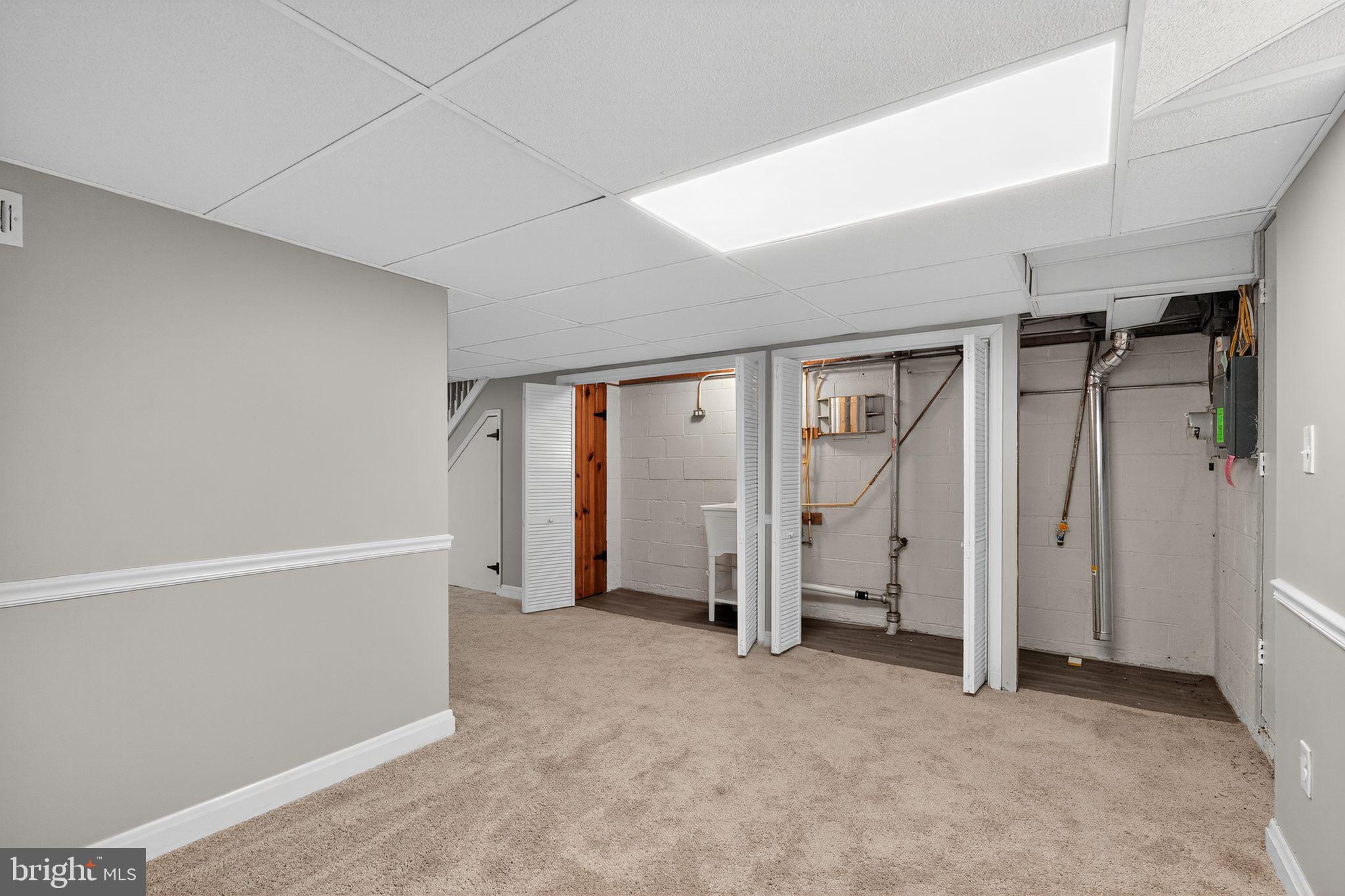 1017 Wicklow Road Baltimore, MD 21229 - Photo 31 of 34 an empty room with closet and a window