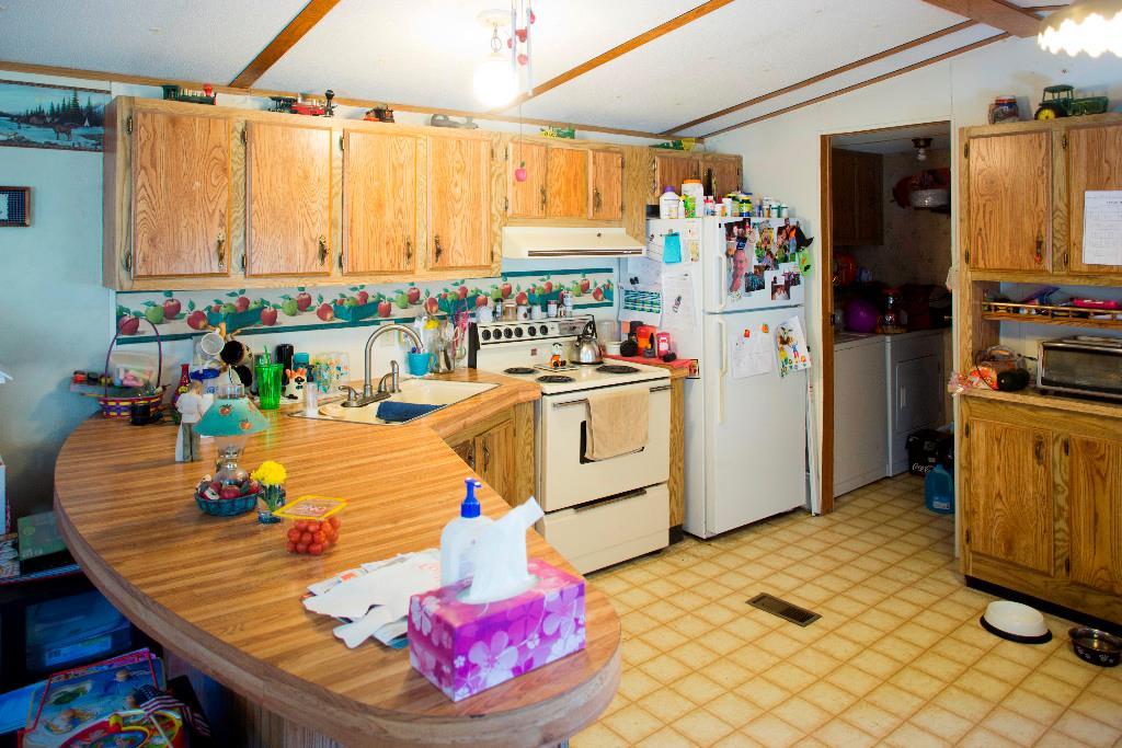 256 Grant Road St. Albans, ME 04971 - Photo 6 of 21 Peninsula adds counter space to prep...