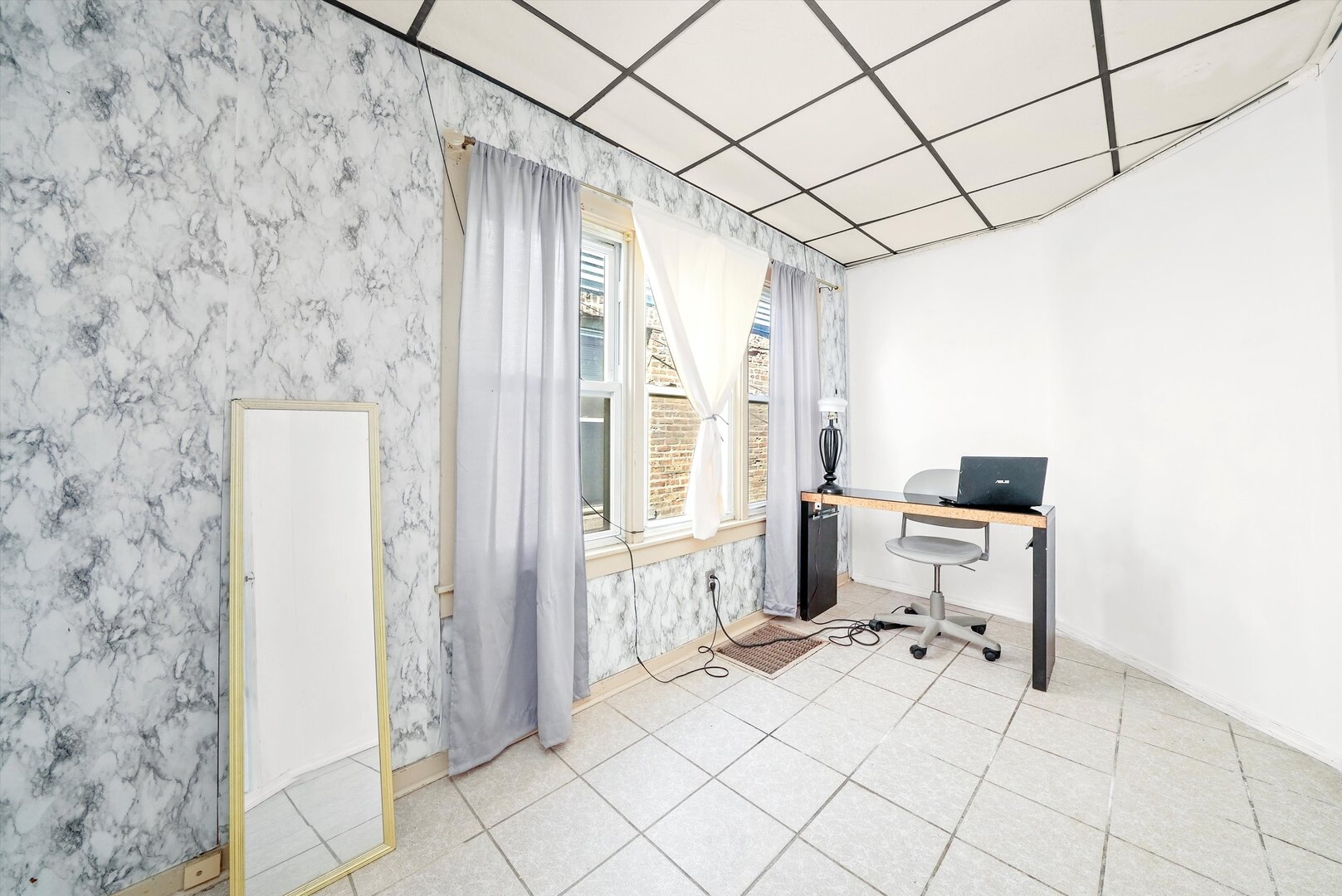 4943 South Marshfield Avenue Chicago, IL 60609 - Photo 11 of 36 a bathroom with a toilet and a shower