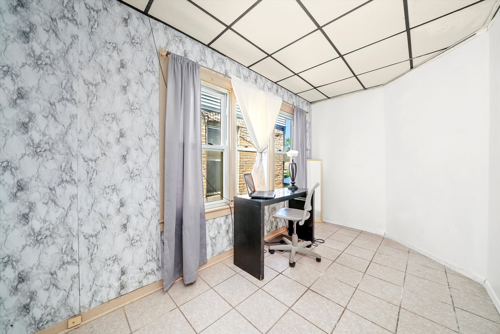 4943 South Marshfield Avenue Chicago, IL 60609 - Photo 12 of 36 a bathroom with a toilet and a shower