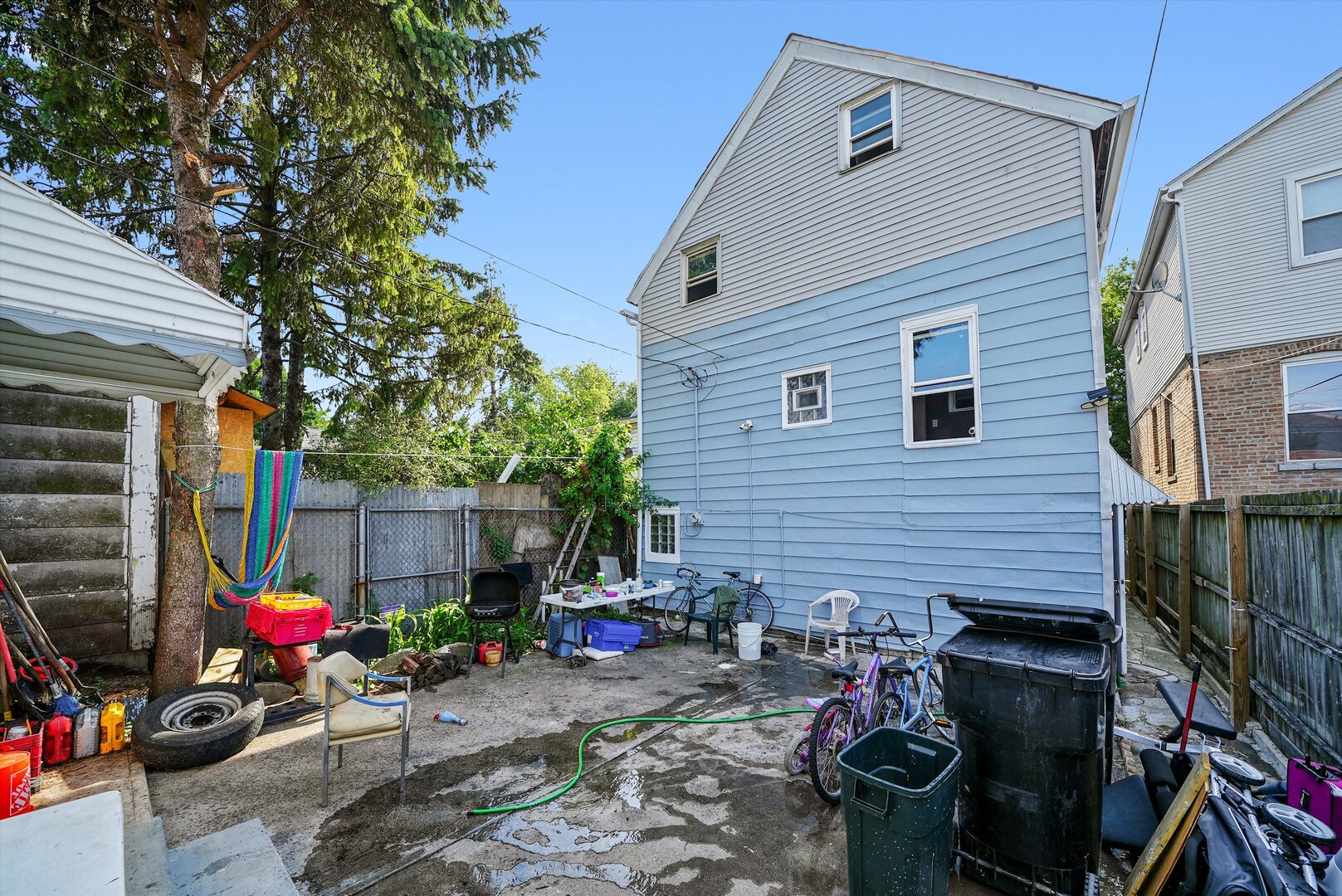 4943 South Marshfield Avenue Chicago, IL 60609 - Photo 34 of 36 a backyard of a house with seating space
