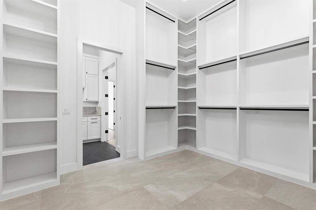 6257 Turner Way Dallas, TX 75230 - Photo 20 of 39 a view of an empty walk in closet