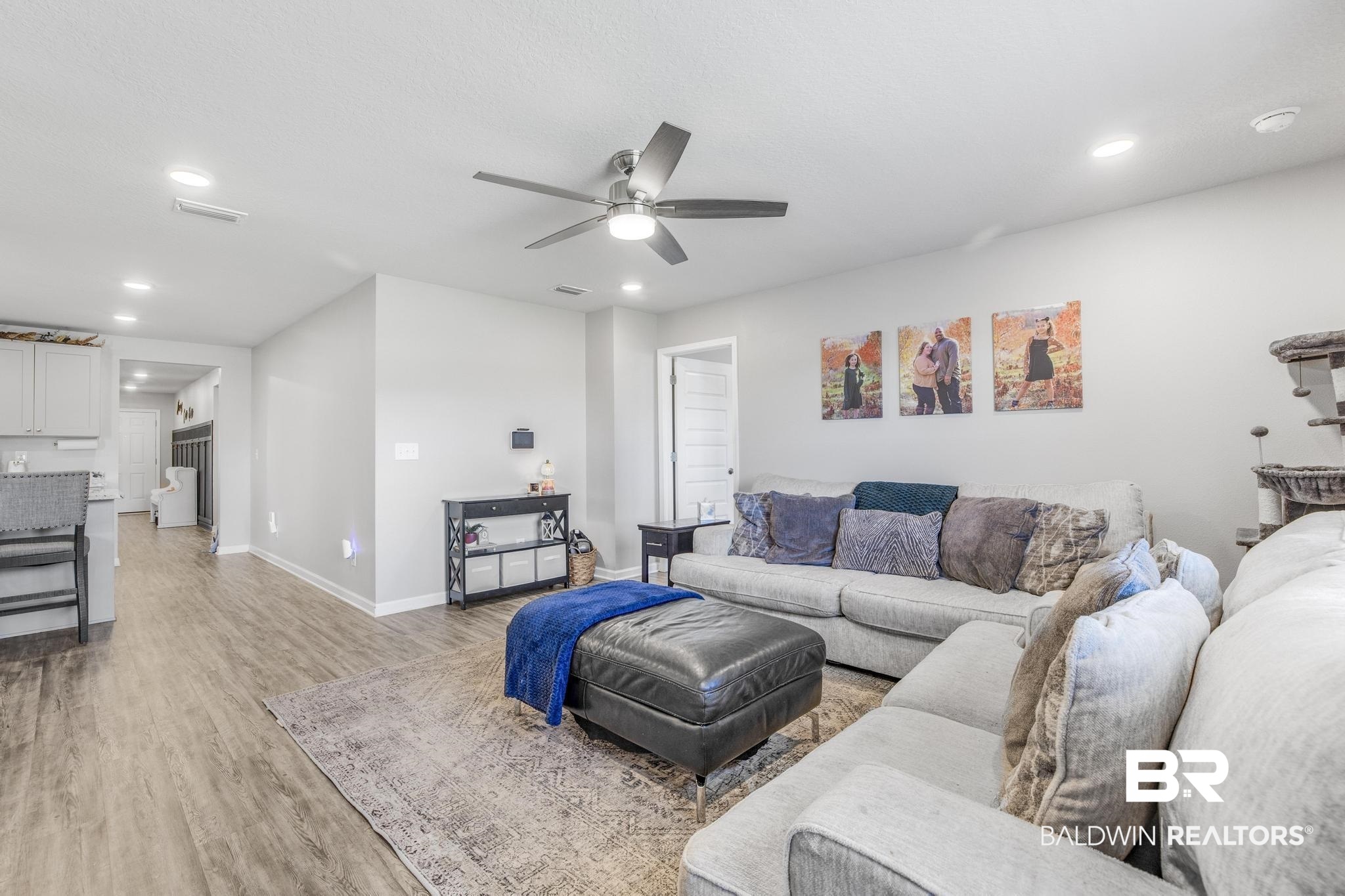 10738 Ridgeview Drive Mobile, AL 36608 - Photo 13 of 48 Living room with light wood-style floors, recessed lighting, and ceiling fan