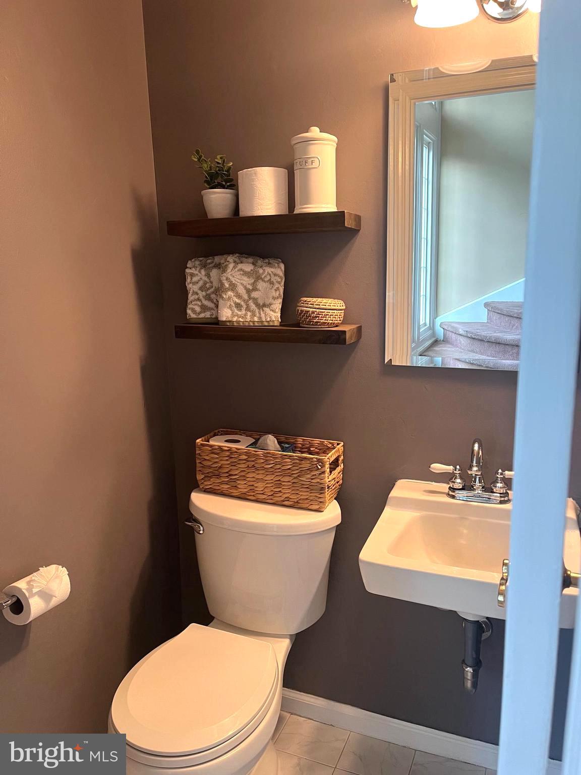 2802 Waterford Drive Cinnaminson, NJ 08077 - Photo 13 of 59 a bathroom with a toilet sink and mirror