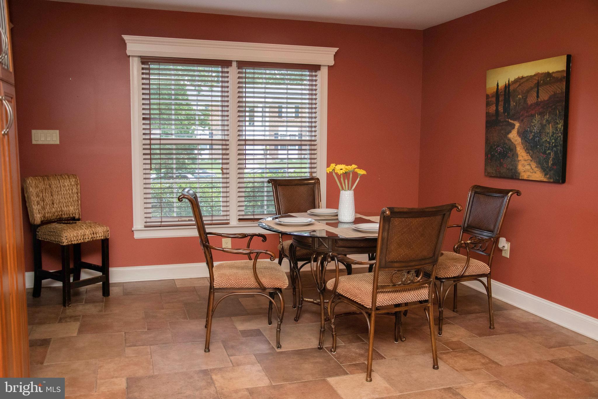 2802 Waterford Drive Cinnaminson, NJ 08077 - Photo 19 of 59 a view of a dining room with furniture and a window