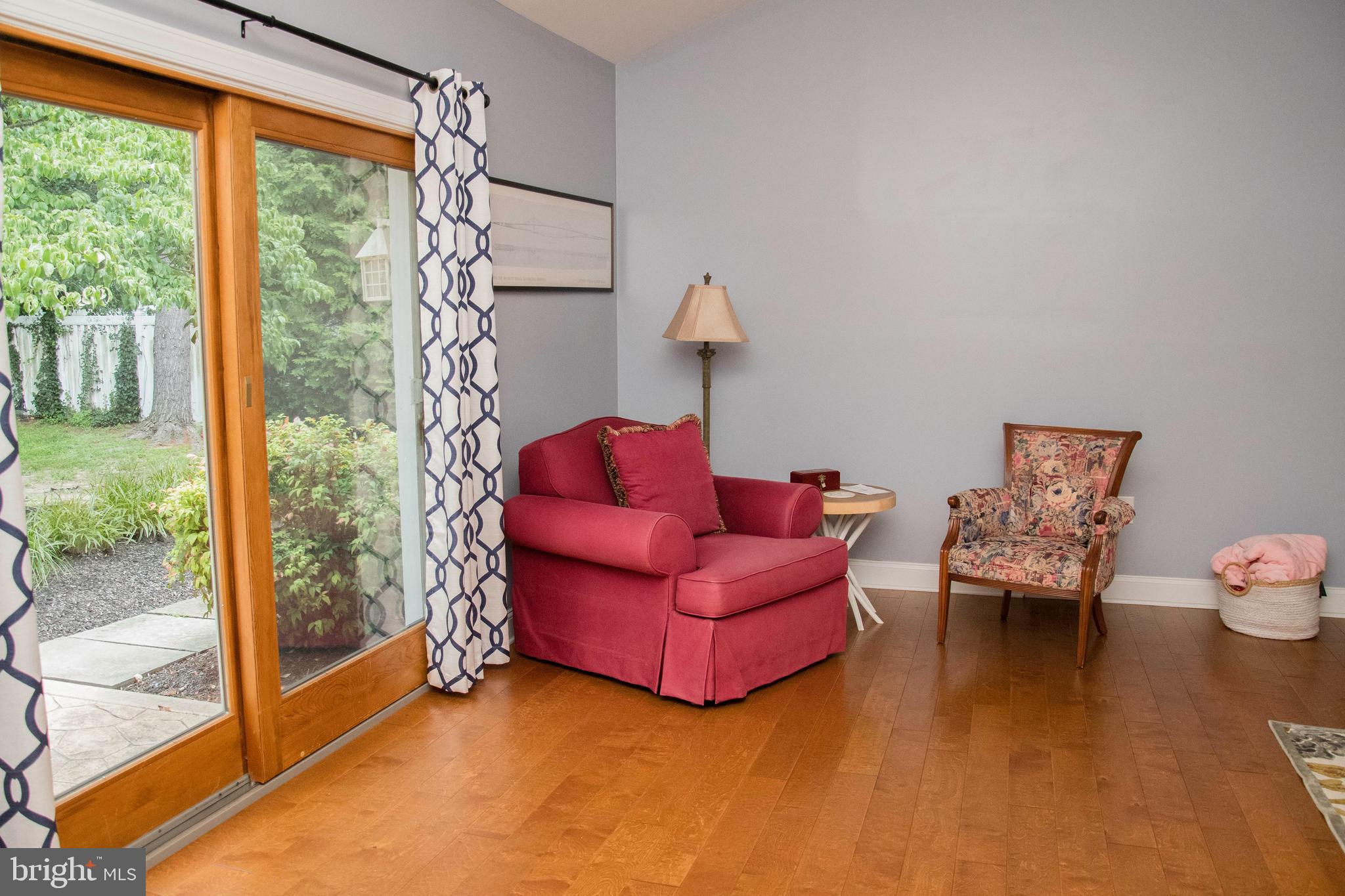 2802 Waterford Drive Cinnaminson, NJ 08077 - Photo 27 of 59 a living room with furniture and a floor to ceiling window