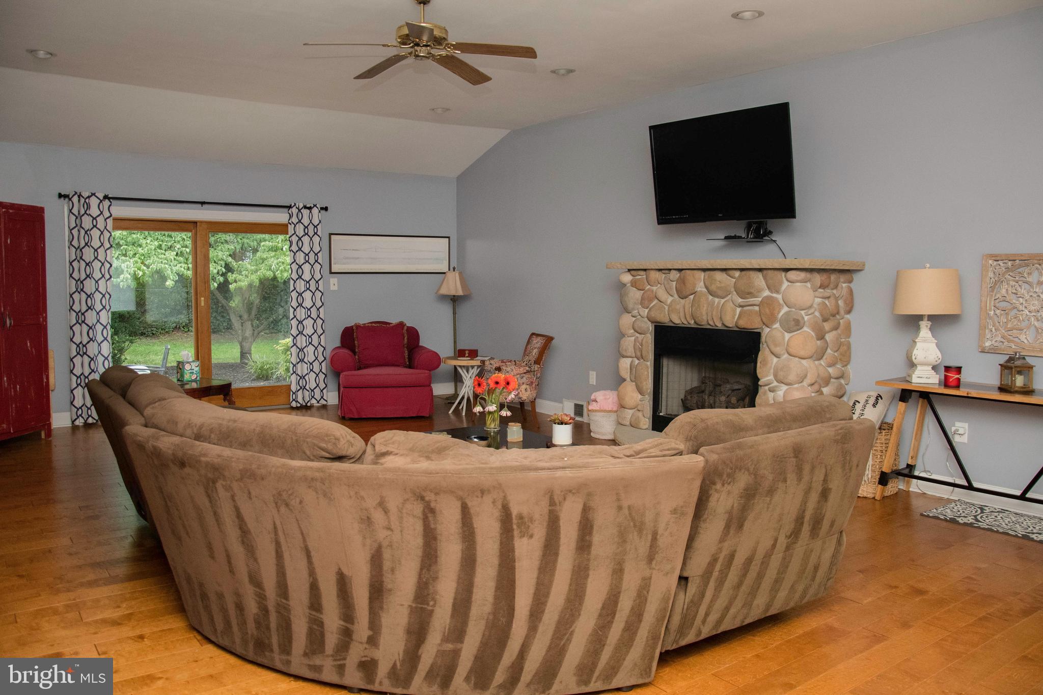 2802 Waterford Drive Cinnaminson, NJ 08077 - Photo 28 of 59 a living room with furniture fireplace and flat screen tv