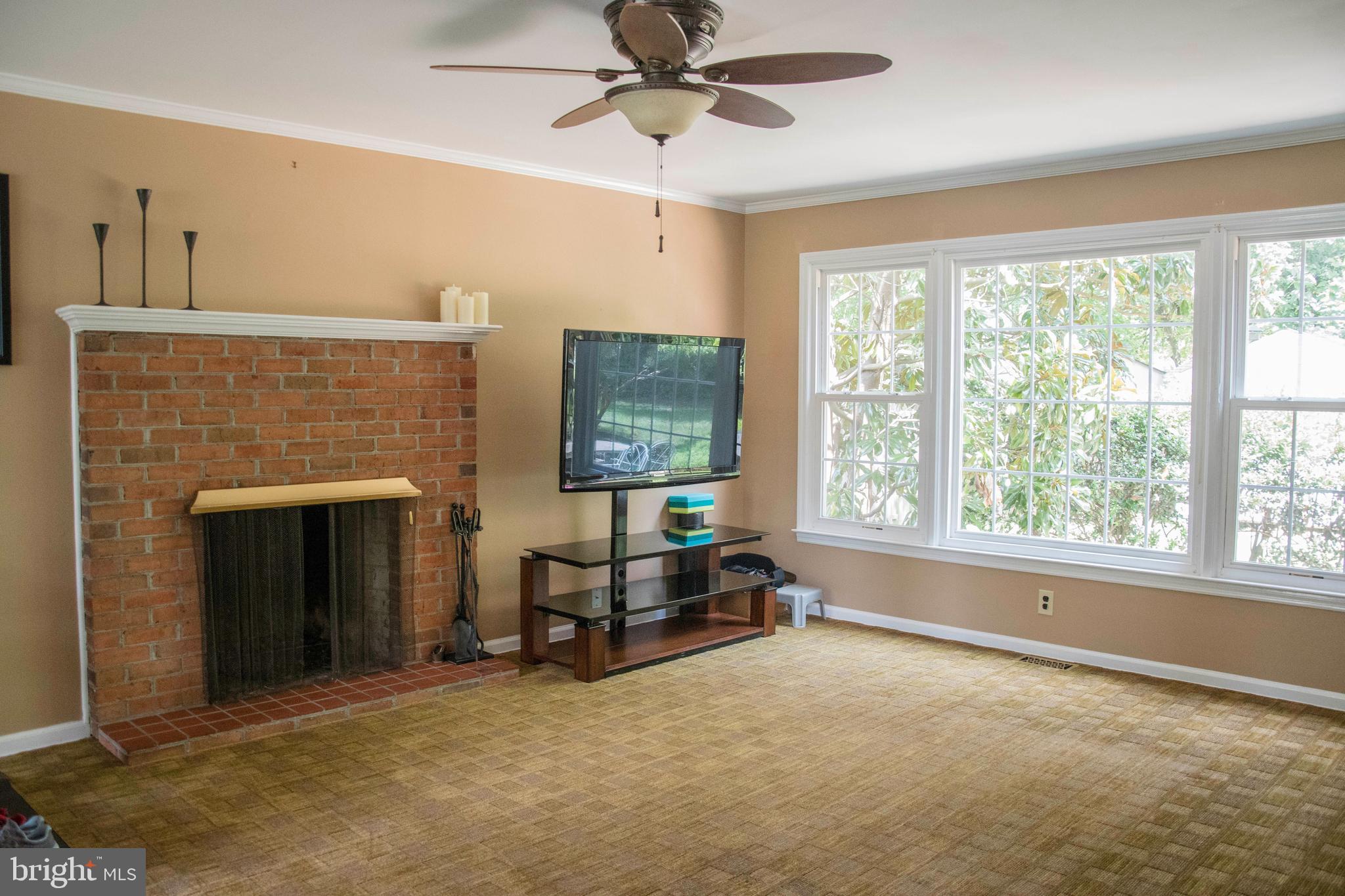 2802 Waterford Drive Cinnaminson, NJ 08077 - Photo 31 of 59 a living room with furniture and a fireplace