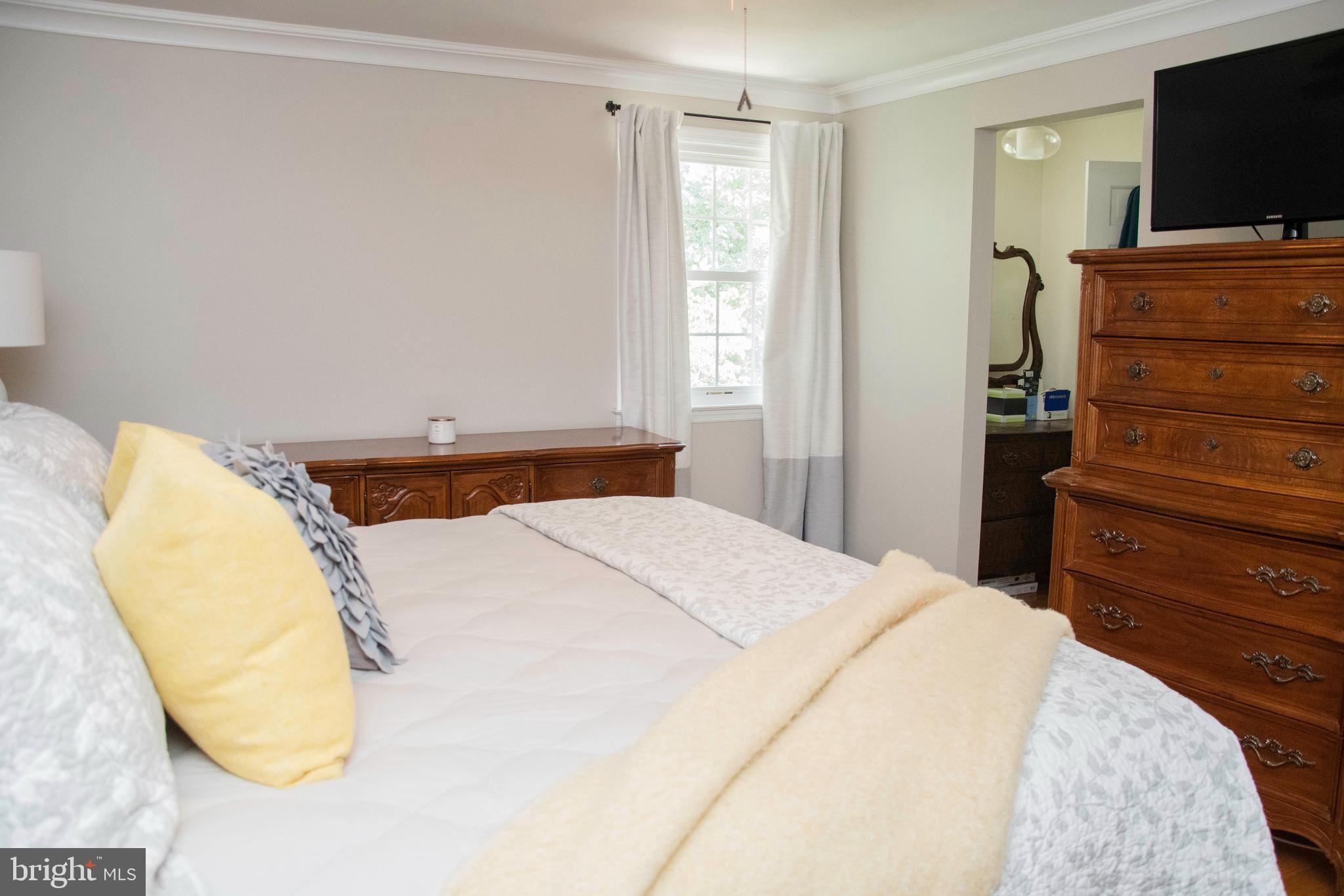 2802 Waterford Drive Cinnaminson, NJ 08077 - Photo 36 of 59 a bedroom with a bed and wooden floor